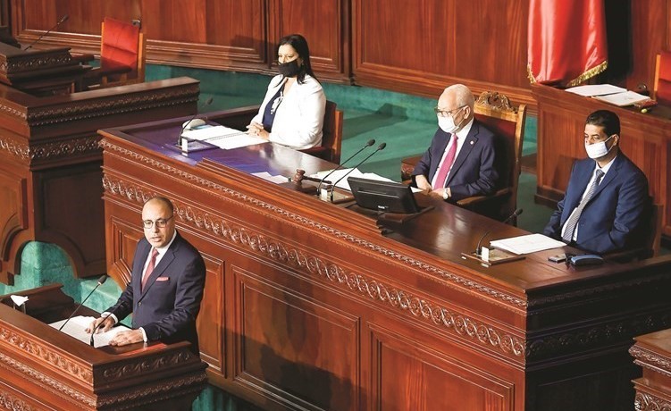 رئيس الوزراء المكلف هشام المشيشي خلال إلقاء كلمته في جلسة الثقة 	 (أ.ف.پ)