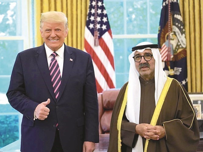 الرئيس الأميركي والشيخ ناصر صباح الأحمد خلال التكريم