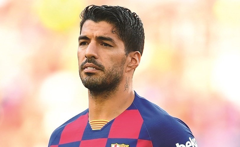 سواريز يفسخ عقده مع برشلونة ويتفق مع أتلتيكو مدريد