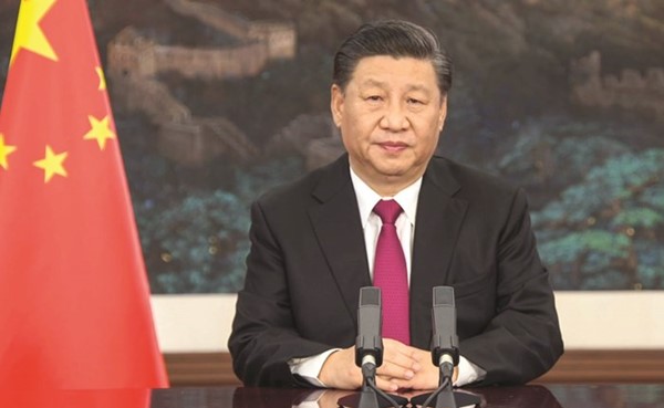 الرئيس الصيني خلال افتتاح المنتدى الافتراضي	(أ.ف.پ)