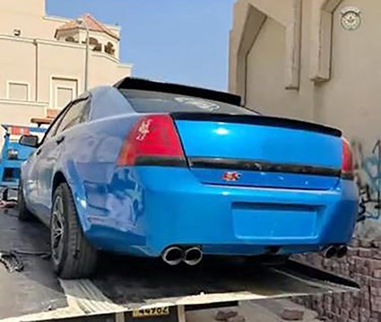 مركبة مخالفة في طريقها الى كراج الحجز