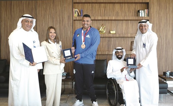 الإدارة التنفيذية في بنك الكويت الوطني تكرم أبطال الكويت الفائزين بميداليات دورة الألعاب البارالمبية