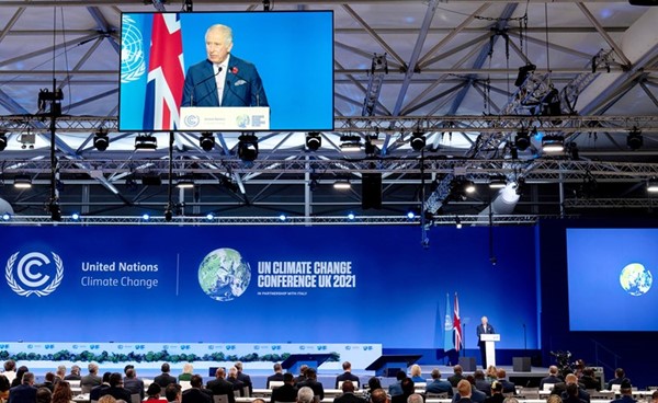 رئيس الوزراء البريطاني بوريس جونسون متحدثا في الجلسة الافتتاحية لقمة المناخ في غلاسكو	(رويترز)