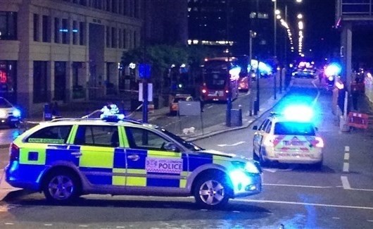 رجلا شرطة في لندن ينتظران صدور حكم فى قضية مشاركتهما صورا من مسرح جريمة
