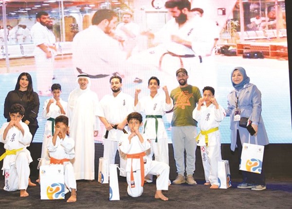 النائب مهلهل المضف وأبرار المسعود مع فريق كيوكشن كاي