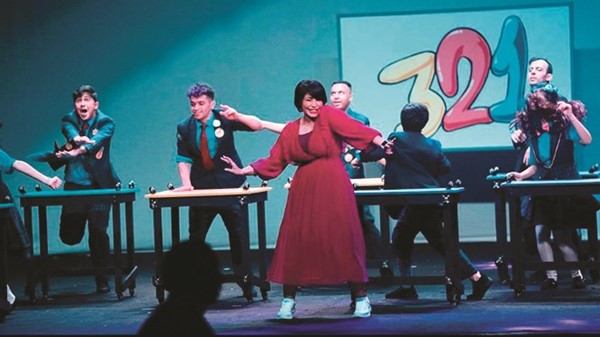 مشهد من مسرحية أكشن 123