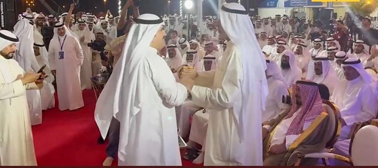 السويط مع عباس الشعبي خلال الندوة