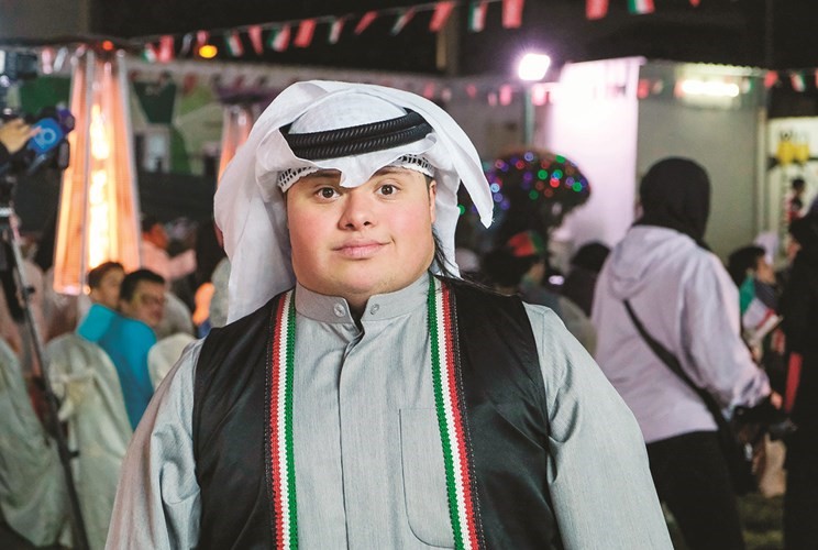 أحد أبطال متلازمة الداون يشارك بالاحتفالات الوطنية