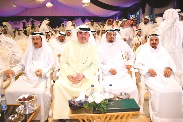 محمد البراك متوسطا بعض الحضور