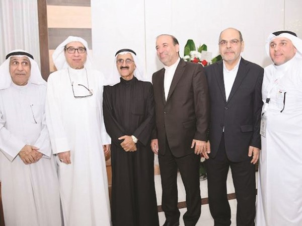 السفير الإيراني محمد توتونجي ومستشار السفارة سمير أرشدي والباحث محمد كمال وعبدالرضا أسيري