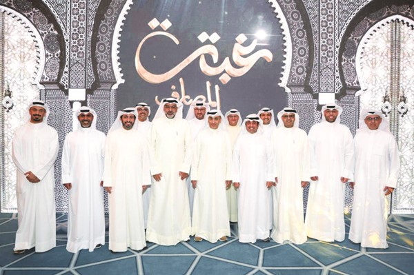 عبدالله التويجري وعبدالله المجحم وأحمد الفهد في لقطة جماعية مع موظفي بنك بوبيان خلال الغبقة