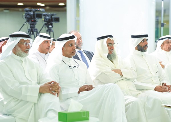 فهد الغانم وأحمد العمر ومعاذ العصيمي وصلاح المريخي خلال الجمعية العمومية لبيت التمويل الكويتي