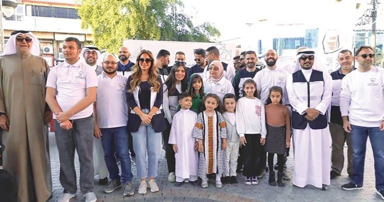 الكويت للتأمين توزّع وجبات إفطار صائم بالتعاون مع بنك الطعام خلال الشهر الفضيل