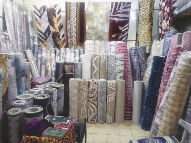 رواج في سوق الملابس المصري بمناسبة أعياد الميلاد ورأس السنة الجديدة