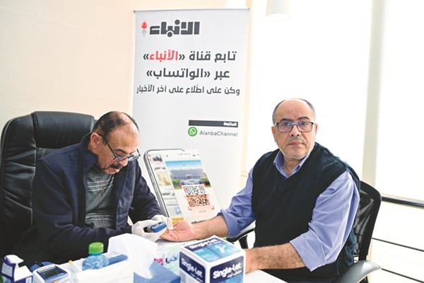 الزميل حسام عبدالمنعم خلال عملية الفحص