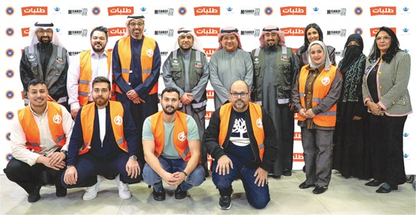 ممثلو طلبات ومطاحن الدقيق وجمعية مشرف ونماء الخيرية في صورة جماعية
