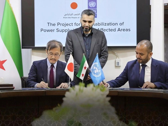 جانب من مراسم توقيع الاتفاقية بين الأمم المتحدة واليابان لتحسين واقع الكهرباء في سورية