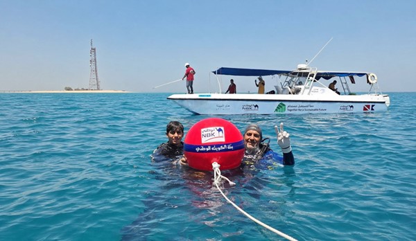 بنك الكويت الوطني يعلن عن شراكة إستراتيجية مع فريق الغوص لتعزيز حماية الشعاب المرجانية